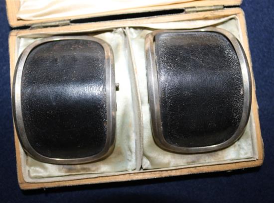 A cased pair of Georgian steel and leather buckles, 2.5in.